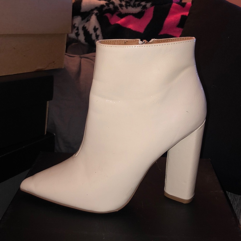 White heel boots.